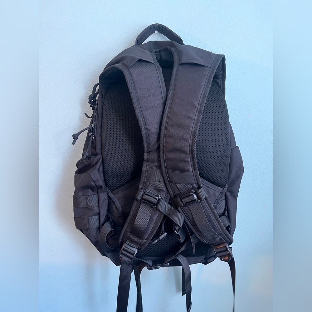 Sleek Black Tactical Backpack - image 2